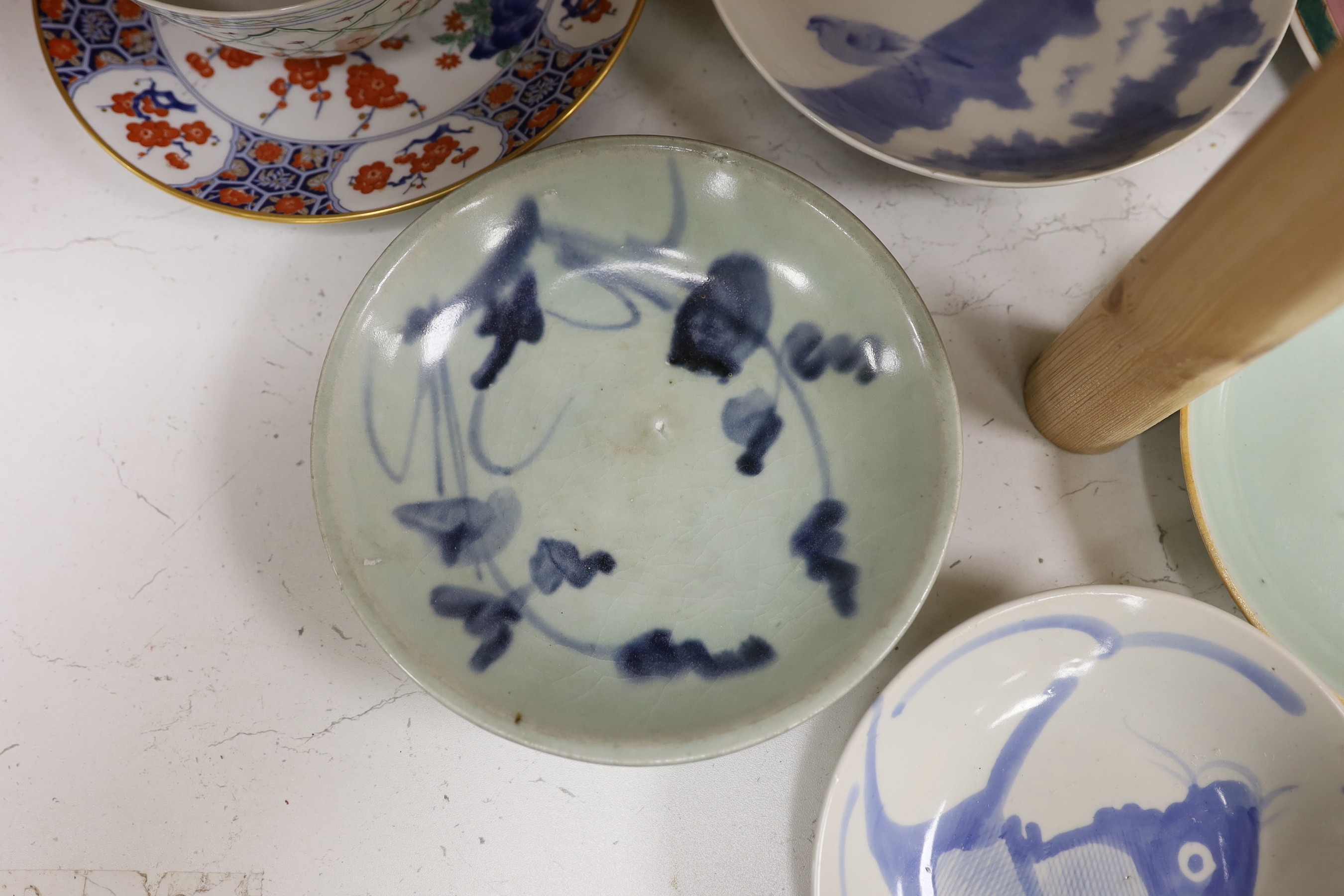 A group of Chinese plates and dishes including a Ming dynasty blue and white bowl
